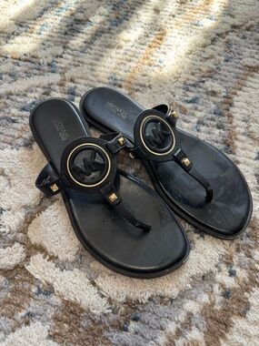 Michael Kors Black Leather Logo Thong Sandals with Gold Stud Details